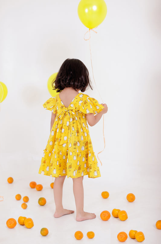 Whimsical Ghost Print Yellow Summer Dress for Girls | Lightweight Cotton Kids Apparel.